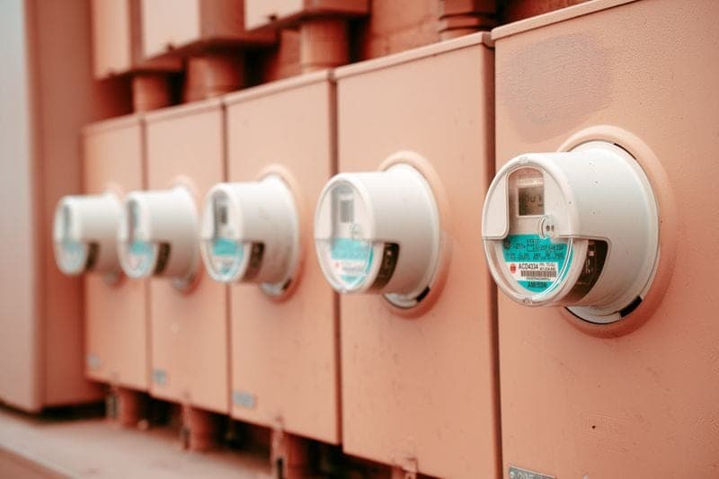 A row of electricity meters recording household consumption